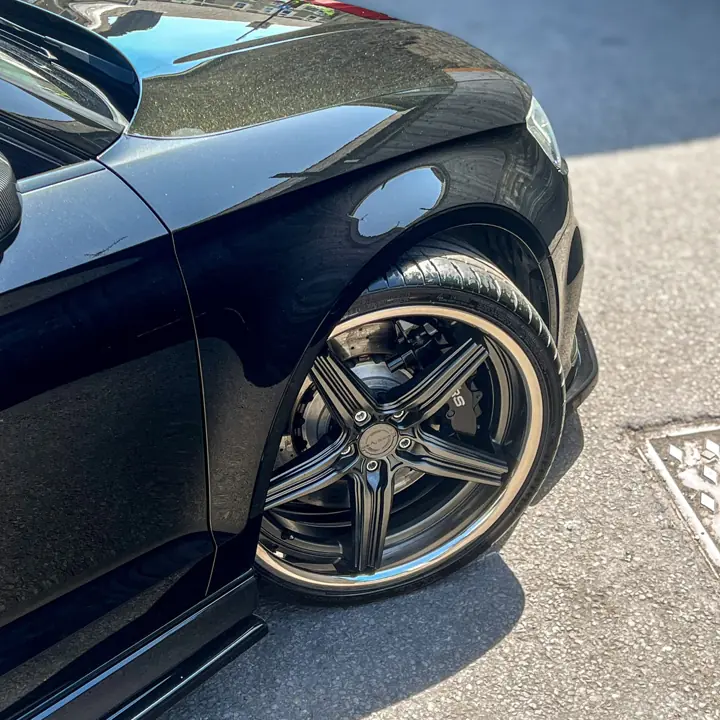 Audi RS front wing and wheel, black, after paint enhancement