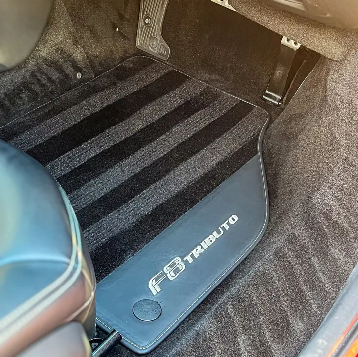 Ferrari F8 Tributo footwell and mat after an interior deep clean
