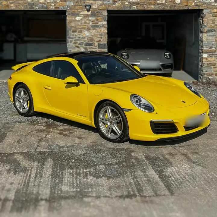 Porsche 911 Carrera, yellow, after a full detail